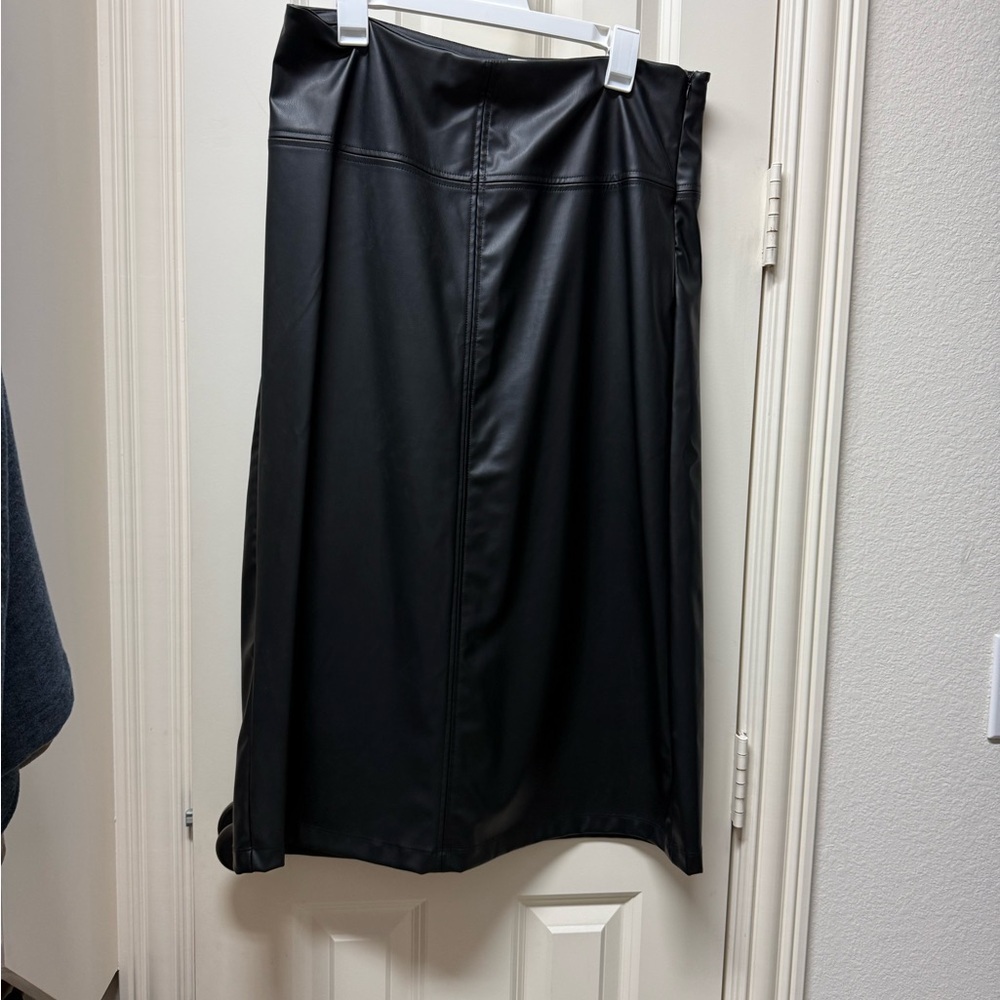 Black pleather skirt.  Side zip. Size 12